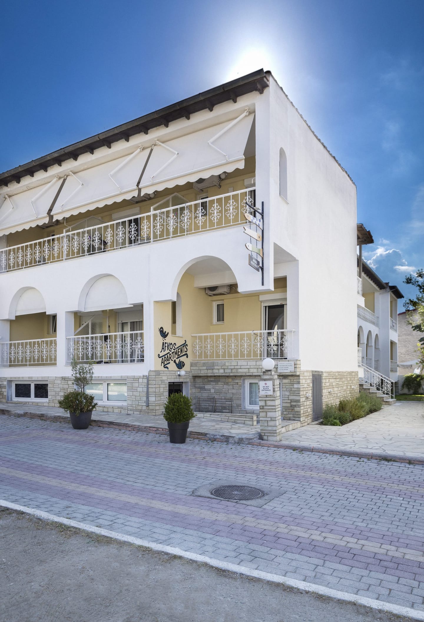 Afkos Apartments building seen from the street